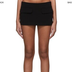 Minimal Black Mini Skirt with Front Flap Pockets